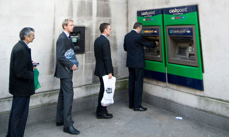 Queue at Lloyds TSB bank cash point 