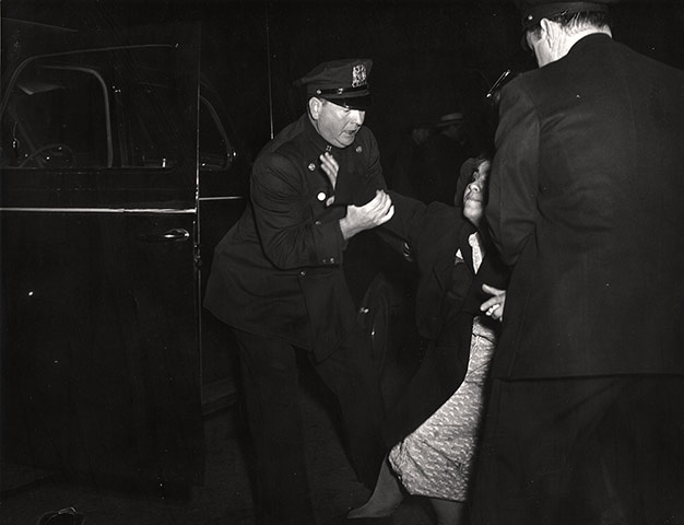 Weegee exhibition: The dead man's wife arrived, by Weegee