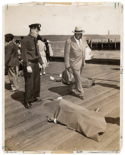 Weegee exhibition: Police officer and lodge member by Weegee