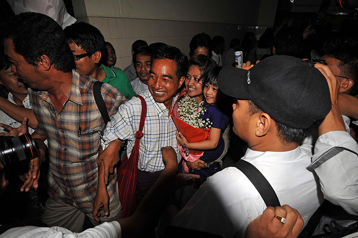 Burma prisoner released: Zaw Thet Htwe is welcomed upon his arrival at Rangoon airport