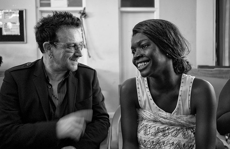 Bono visits Ghana: Bono meets an expectant mother during a visit to the Tema hospital in Accra