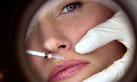 A woman receives a botox injection