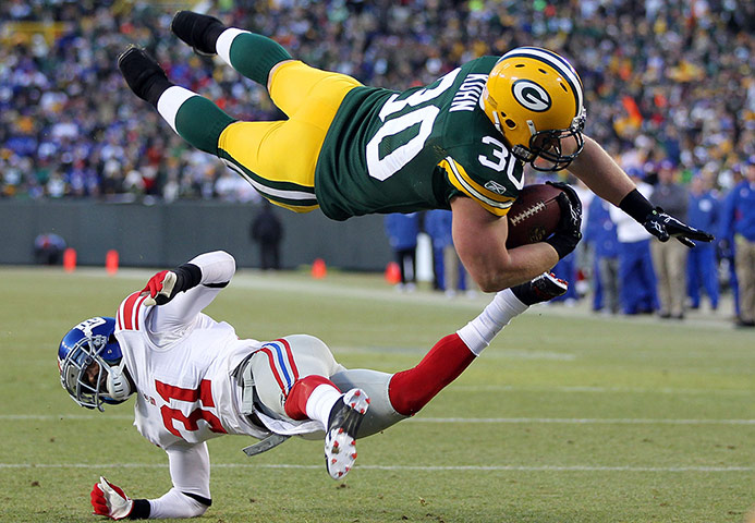NFL Roundup: Divisional Playoffs - New York Giants v Green Bay Packers