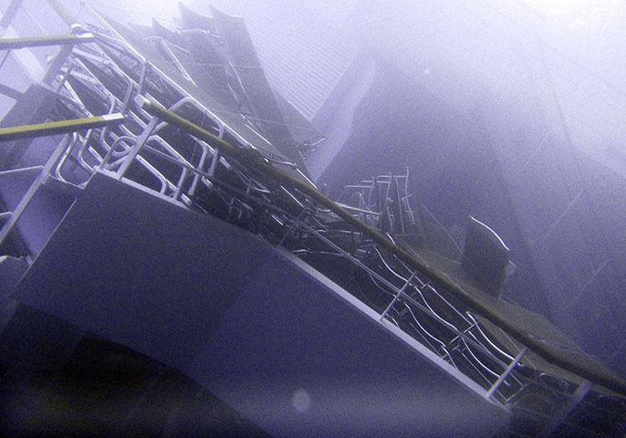 Costa Concordia: A part of the Costa Concordia cruise ship is seen underwater 
