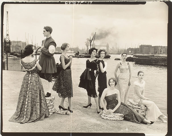 Norman Parkinson: A group by the river, Rotherhithe Docks, from Vogue 1954