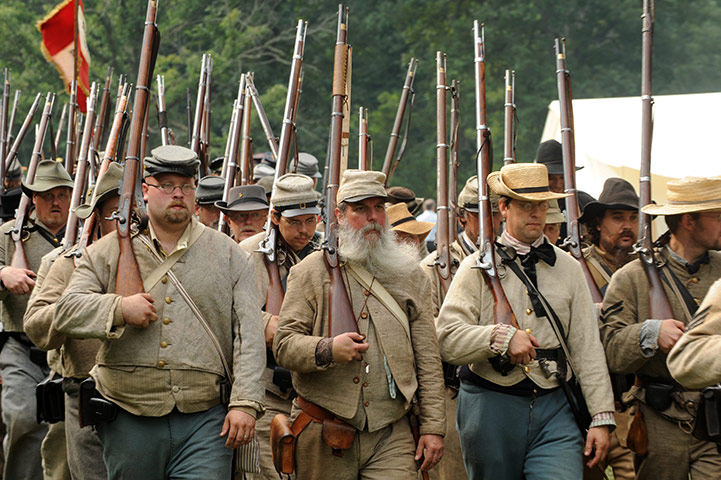 FTA: Michael Reynolds: Civil War reenactors portraying Confederate soldiers march to battle 
