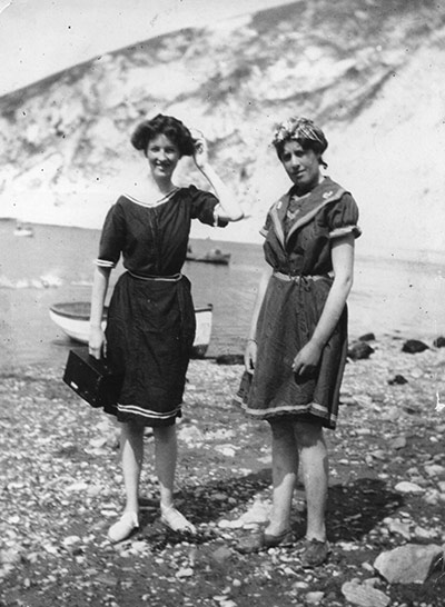 Kodak: August 1911: Two women enjoy a sunny day on the beach at Lulworth Cove