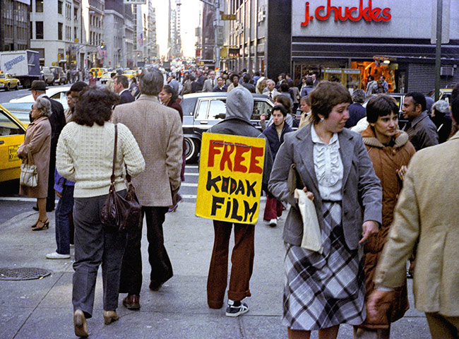 Kodak: 1980s: A 'Free Kodak Film' sandwich board in New York