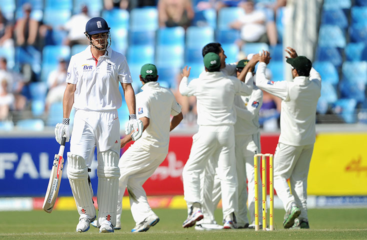 England Pakistan day 3: Alastair Cook leaves the field after being dismissed by Pakistan's Umar Gul