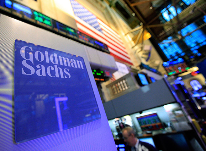 Week in Business: A Goldman Sachs sign on the company's post at the New York Stock Exchange