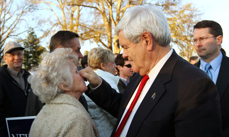 Newt Gingrich pinching a lady's nose