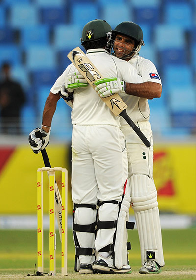 Pakistan versus England: Mohammad Hafeez and Taufeeq Umar of Pakistan celebrate victory over England