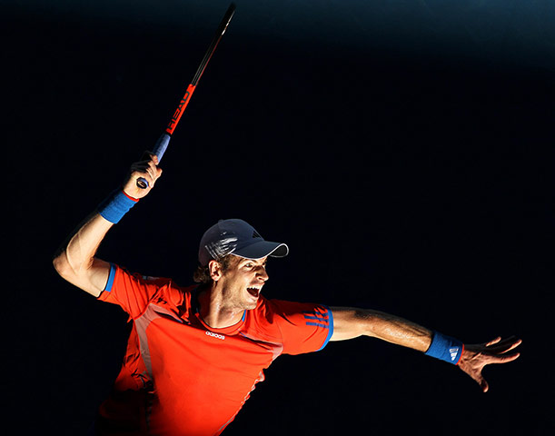 Australian Open Day 4: Andy Murray serves in his round match against Edouard Roger-Vasselin