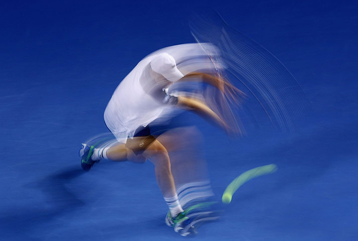Australian Open Day 4: Andy Roddick plays a shot against Lleyton Hewitt