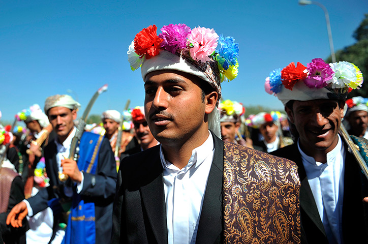 24 hours: Sana'a, Yemen: Grooms from the Republican Guard Forces at a mass wedding 