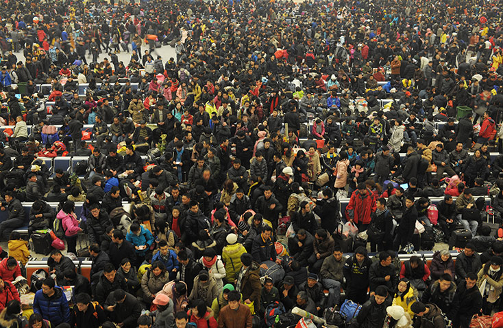 China Spring Festival: Passengers at Hankou Railway Station in Wuhan