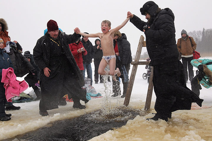 24 hours in pictures: Orthodox Epiphany Celebrations
