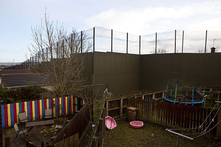 Peace Wall: The Peace Wall that runs Towards Newtownabbey in Belfast