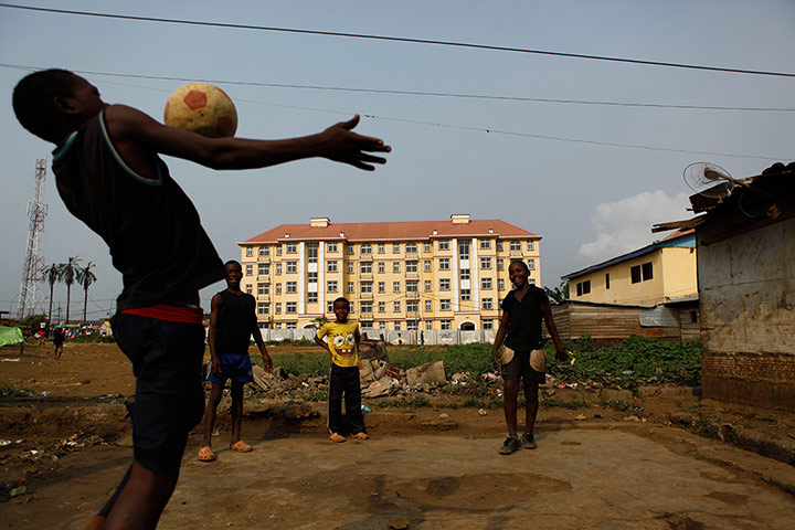 24 Hours: Boys practice their soccer skills in Malabo, Equatorial Guinea