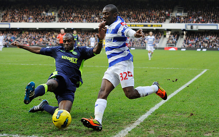 QPR v Wigan: Boyce tackles Wright-Phillips as he crosses