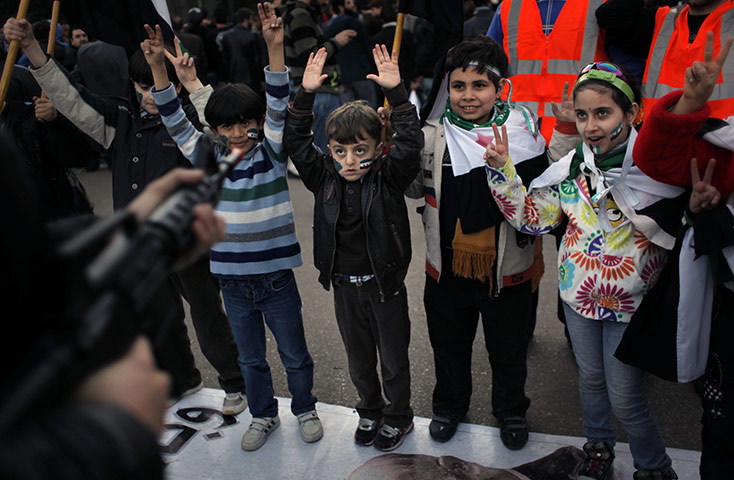 24 hours in pictures: Cairo, Egypt: Anti-Syrian regime child protesters at a protest