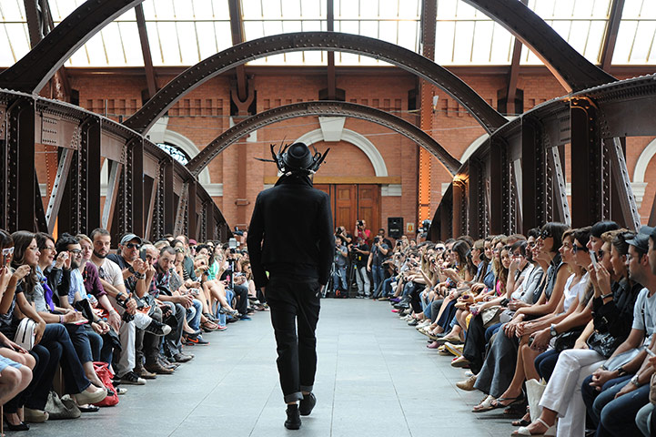 24 hours in pictures: Sao Paulo, Brazil: A model presents a creation by Cavalera 