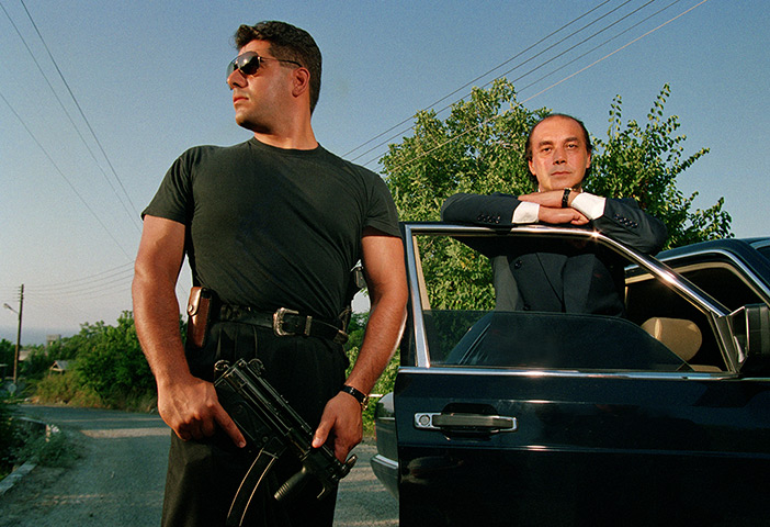 asil nadir: Asil Nadir and his bodyguard  in northern Cyprus 