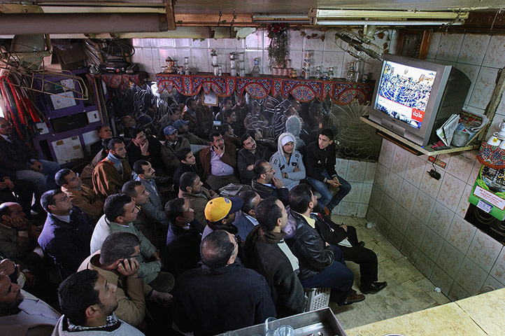 Eyptian Parliament: Men gather to watch the parliament session on television