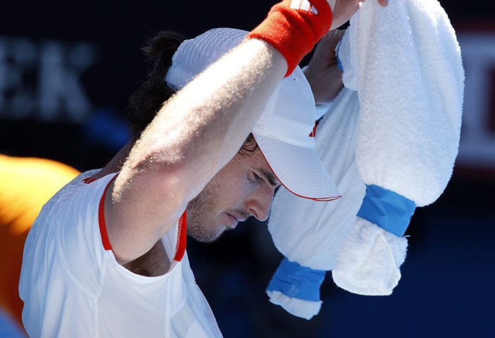 Australian Open Day 8: Andy Murray of Britain tries to cool off with an ice pack