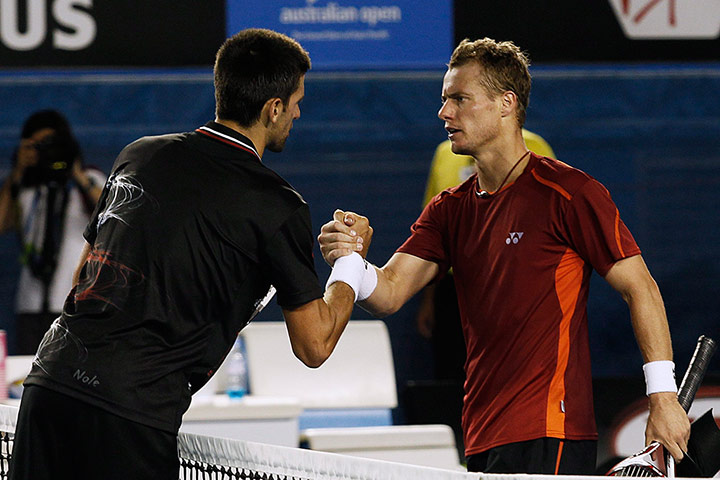 Australian Open Day 8: Novak Djokovic shakes hands with Lleyton Hewitt after winning his match