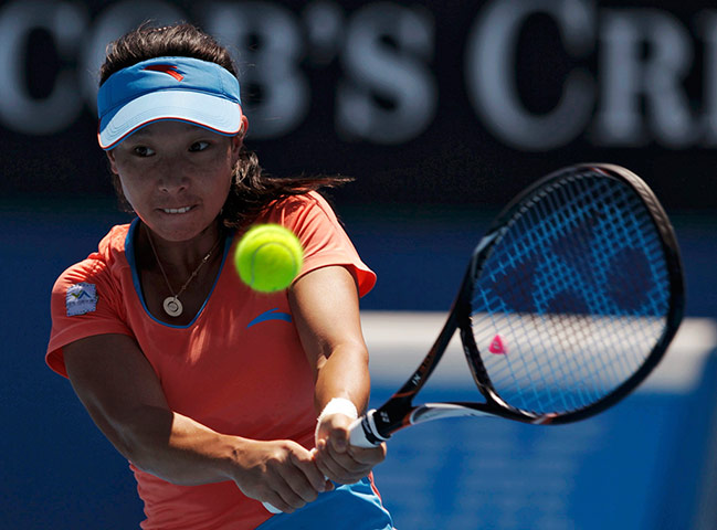 Australian Open Day 8: Zheng Jie of China hits a return to Sara Errani of Italy