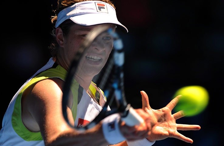 Aussie Open day 9: Kim Clijsters returns to Caroline Wozniacki at the Australian Open