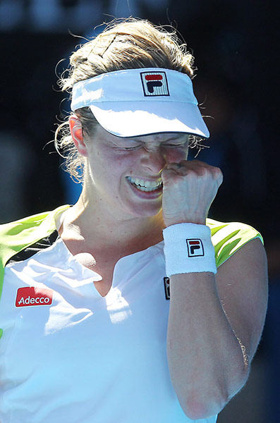 Aussie Open day 9: Kim Clijsters celebrates victory over Caroline Wozniacki at the Aussie Open