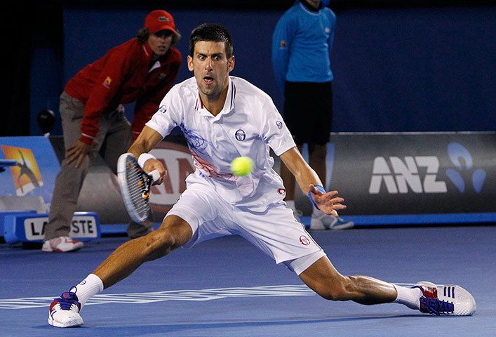 Australian Open day 10: Djokovic hits a return to Ferrer 