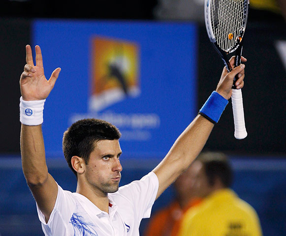Australian Open day 10: Novak Djokovic celebrates after beating David Ferrer
