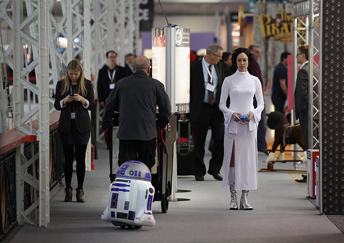 24 hours in pictures: A woman dressed as Princess Leia at the 2012 London Toy Fair, London
