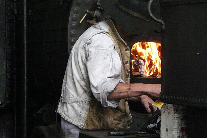 In pictures: missing: Man tending steam engine