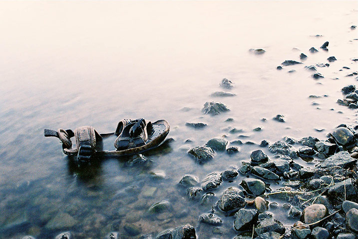 In pictures: missing: Single sandal washed up by a lake