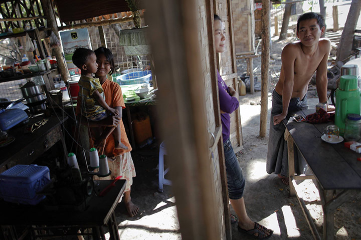 Burma economic reform: People pass time at their home on the outskirts of Naypyitaw, Burma 