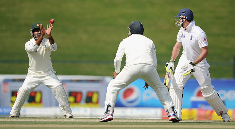 second test day 2: England captain Andrew Strauss is caught out by Asad Shafiq of Pakistan 