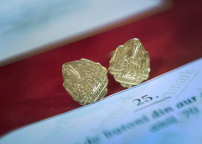 Ceausescu auction: Gold buttons belonging to Nicolae Ceausescu 