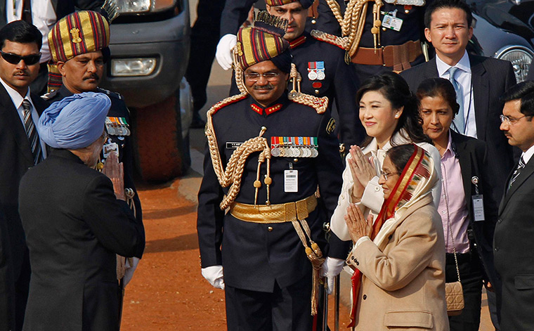 India Republic Day: Manmohan Singh is greeted at the Republic Day parade in New Delhi