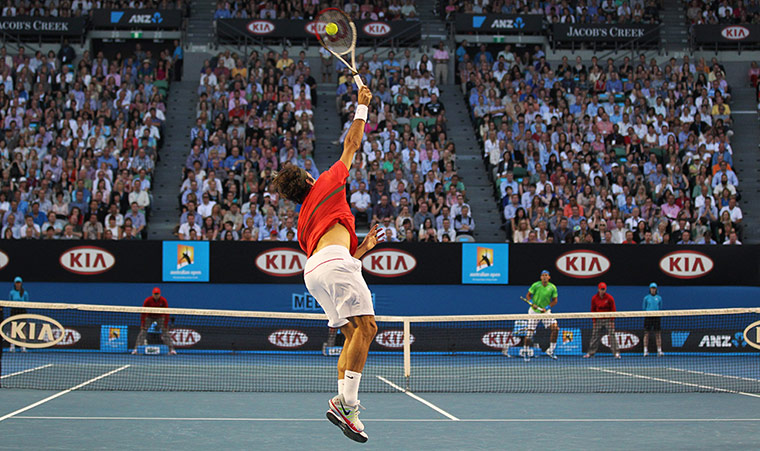 Aussie open day 11: Roger Federer serves to Rafael Nadal during the semi finals