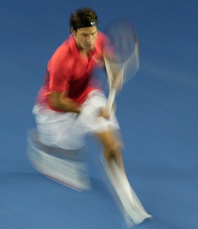 Aussie open day 11: Roger Federer runs to play a shot