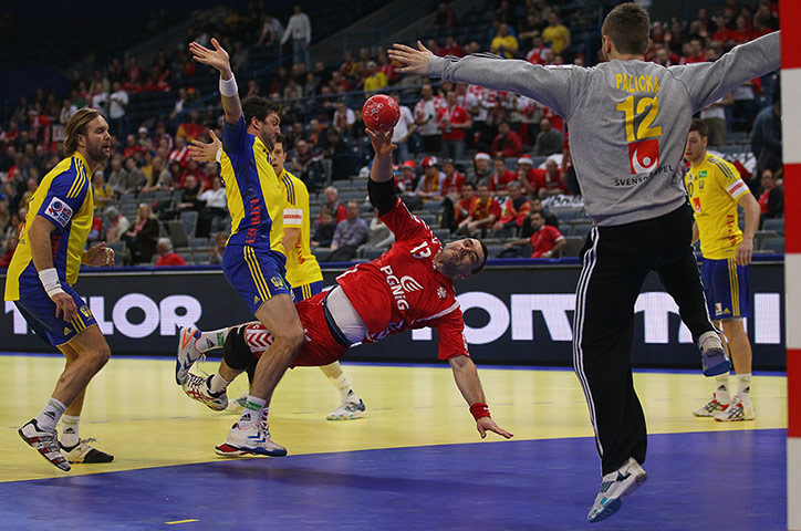 Best of the week: Poland's Bartosz Jurecki scores at the Men's European Handball Championship