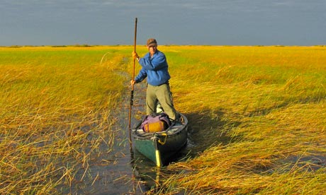 Phil Harwood canoeing in the Congo