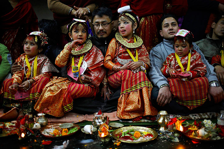 24 Hours: Adorned Newar girls during an Ihi ceremony in Kathmandu
