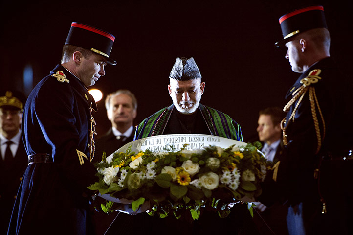 24 Hours: Afghanistan's President Hamid Karzai lays a wreath in Paris