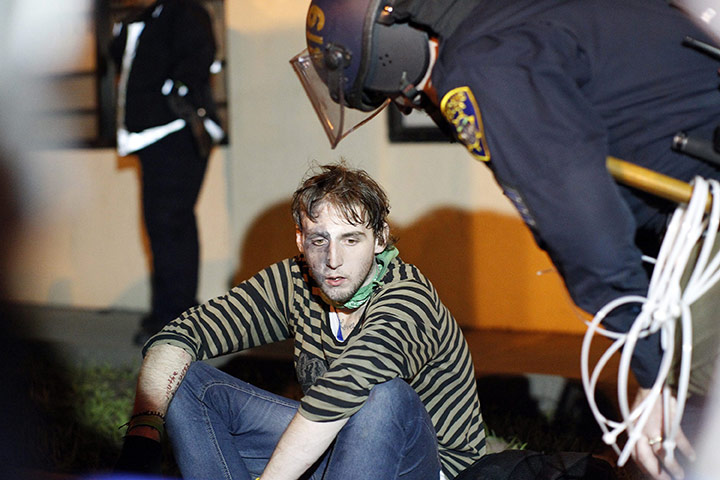 Occupy Oakland: A demonstrator in Oakland waits for medical assistance 