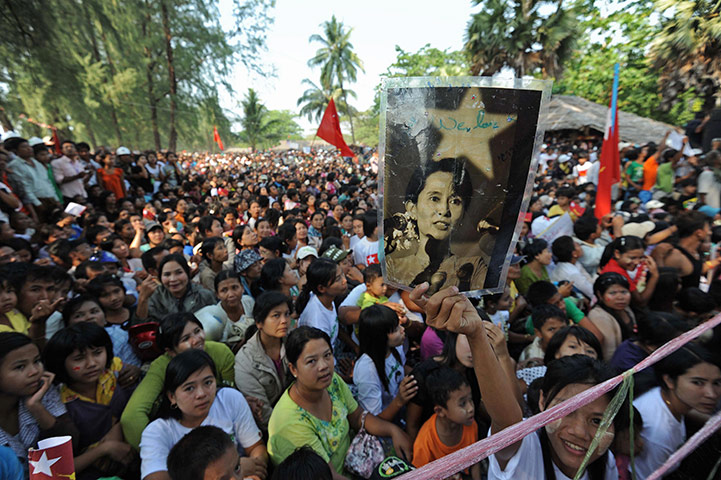 Aung San Suu Kyi campaign: A supporter holds up a picture of Aung San Suu Kyi in Dawei 